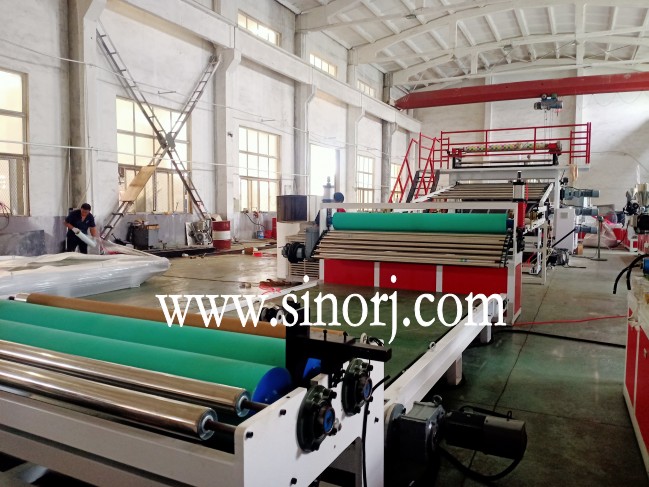 仿大理石板生產線，地板革生產線，三輥四輥集裝箱發貨中